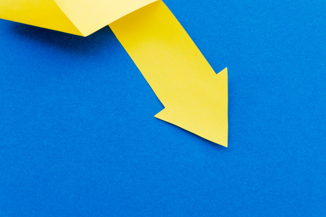 Photo: yellow paper arrow pointing down