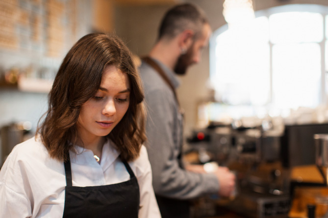 Photo: young woman, cafe worker